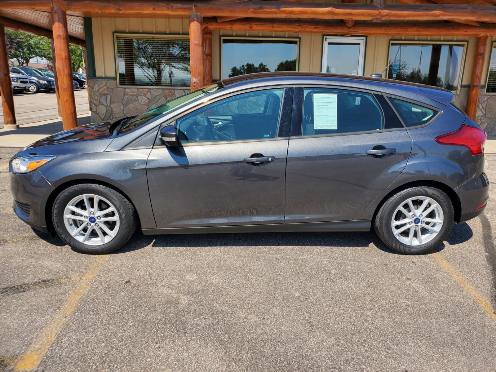 2016 Tan /Black Ford Focus SE (1FADP3F23GL) with an 2.0L 4Cyl GDI TI-VCT engine, 6-Speed Powershift Automatic transmission, located at 1600 E Hwy 44, Rapid City, SD, 57703, (605) 716-7878, 44.070232, -103.171410 - Photo #31